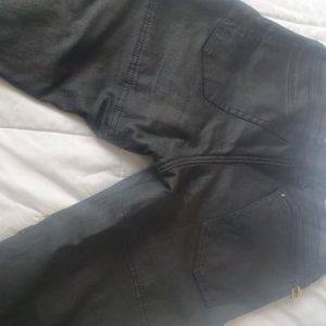 TRIUMPH MOTORCYCLE BOOTS AND TROUSERS FOR SALE