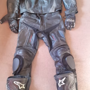 Full set used TRIUMPH branded Two-piece fully armoured/padded racing leathers, c/w gloves(m) and boots(9/43) for sale