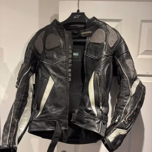 Black leather motorcycle suit for sale